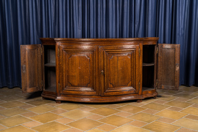 A French oak sideboard with curved front, 18th C.
