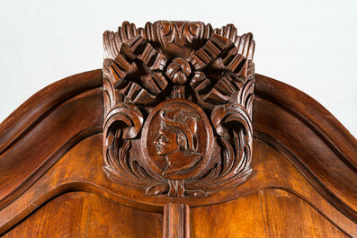 A Dutch mahogany veneered cabinet with two doors and three drawers, 18th C.