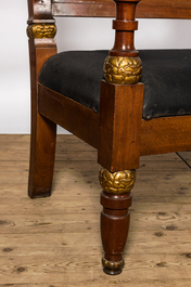 A lavish partly gilt upholstered mahogany bench, probably France, 19th C.