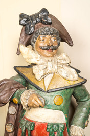 Een paar polychrome terracotta figuren van een man en vrouw, 18/19e eeuw