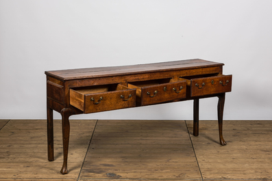 An English oak wooden side table, 19th C.