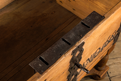 An iron-mounted pine chest on foot, dated 1661, 17th C. and later