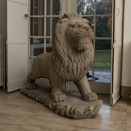 A pair of large patinated wooden lions, 19th C.