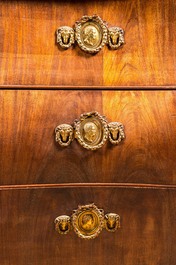 A Dutch mahogany veneered cabinet with two doors and three drawers, 18th C.