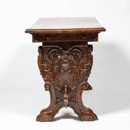 A renaissance-style walnut cheek table, 19th C.