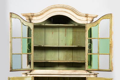A patinated wooden display cabinet, 19th C.