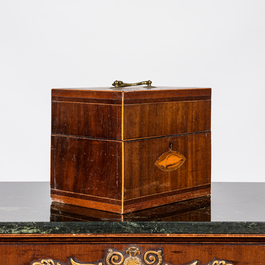 An English mahogany liqueur cellar with six partly gilt carafes, 19th C.