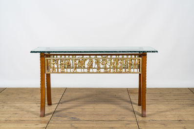 An Italian wooden table with gilt friezes after the antique with a thick glass top, 20th C.
