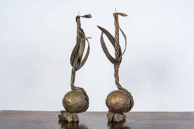 A pair of large patinated bronze plant-shaped candlesticks, 20th C.