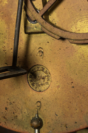 A French patinated and gilt bronze 'ruin' clock with matching candlestick, 19th C.