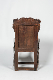 An English walnut and oak wooden armchair, 18th C.