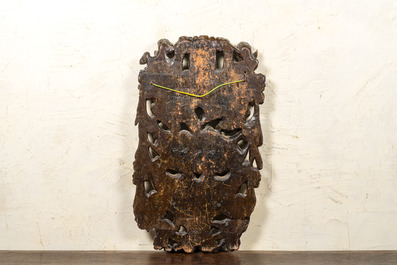 A Flemish reticulated oak panel with a carpenters' guild coat of arms, late 16th C.