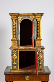 Een tweedelig verguld en polychroom houten tabernakel, 18e eeuw