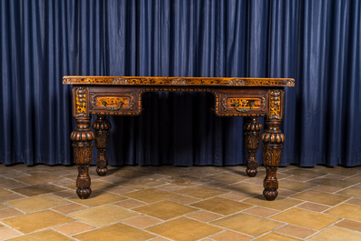 A tortoiseshell veneered and leather-topped wooden desk, 19/20th C.