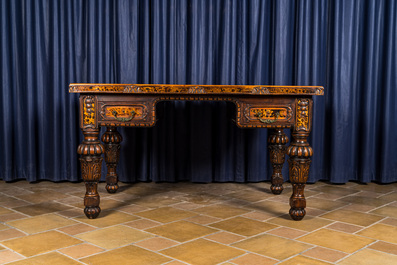 A tortoiseshell veneered and leather-topped wooden desk, 19/20th C.