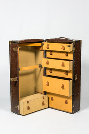 A large leather travel trunk with interior compartments, ca. 1900