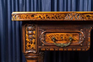 A tortoiseshell veneered and leather-topped wooden desk, 19/20th C.