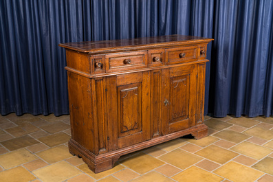 An Italian walnut sideboard with two doors and three drawers, 18th C.