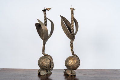 A pair of large patinated bronze plant-shaped candlesticks, 20th C.