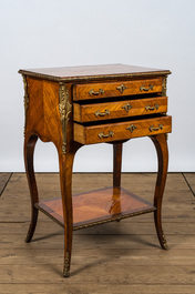 A French gilt bronze mounted three drawer side table, 19/20th C.