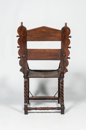 A walnut armchair with wicker upholstery, 19th C.