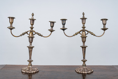 A pair of silver-plated three-light candlesticks, 20th C.