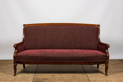 A mahogany Directoire style salon consisting of a sofa and two armchairs, ca. 1900