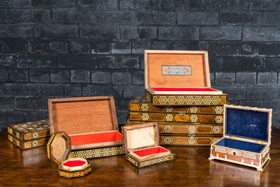 Eight mostly North-African bone- and mother-of-pearl-inlaid wooden coffers and gaming boxes, 19/20th C.