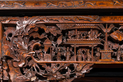 A large Chinese carved and reticulated wooden &eacute;tag&egrave;re, 19th C.