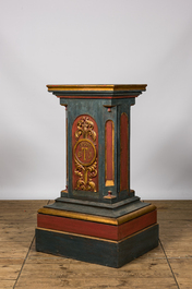 A polychromed and gilt monogrammed wooden column with inner compartment, 19th C.