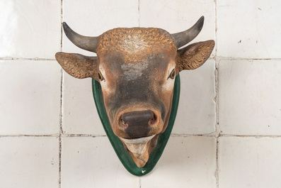 A collection of polychromed terracotta and plaster decorative elements from a butcher's shop, early 20th C.