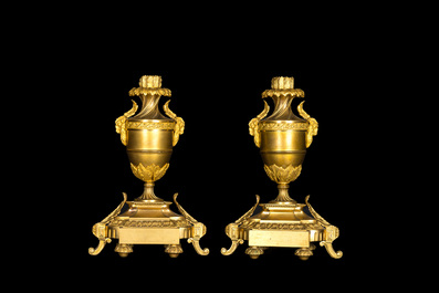 A pair of French gilt bronze Empire-style candlesticks, 19th C.