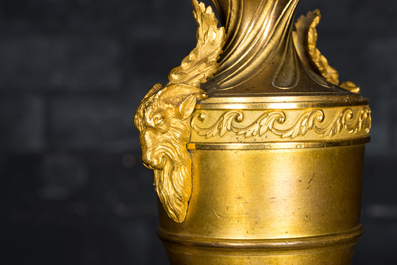 A pair of French gilt bronze Empire-style candlesticks, 19th C.