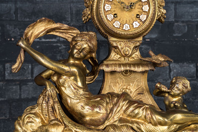 A three-piece gilt bronze clock garniture, France, 20th C.