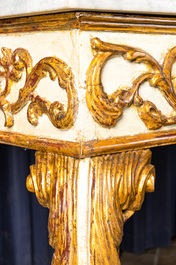 A pair of Italian patinated and gilt wooden wall consoles with marble top, 18th C.