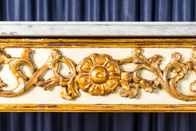 A pair of Italian patinated and gilt wooden wall consoles with marble top, 18th C.