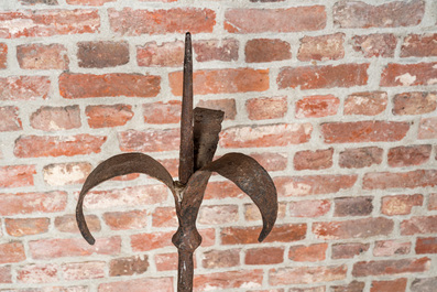 A large wrought iron candlestick, 19th C.