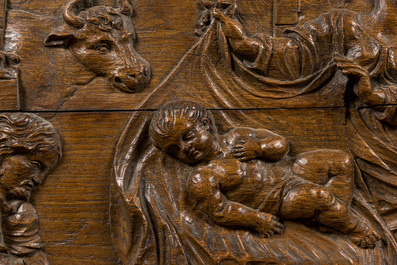 A large rectangular oak carving depicting 'The adoration of the shepherds', 18th C.