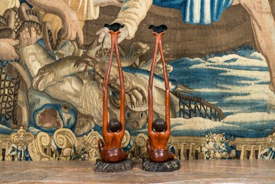 A pair of large Japanese lacquered wood candlesticks depicting Tanaga, Meiji, 19th C.