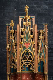 A French Gothic Revival polychromed and gilt wooden canopy, 19th C.