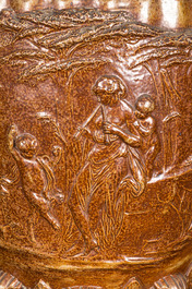 A large patinated stoneware urn with mythological decors, France, 19th C