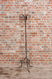 A large wrought iron candlestick, 19th C.