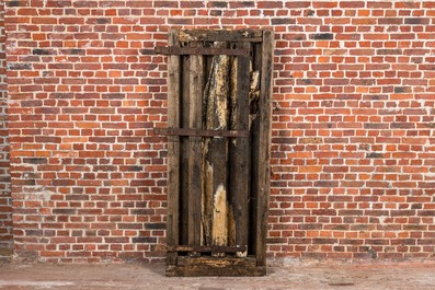A wooden door with wrought iron lock and hinges, 17/18th C.