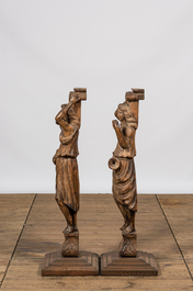 A pair of oak wooden caryatids on foot, 19th C.