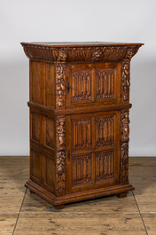 A Gothic Revival oak two-door cupboard with linenfold panels, 19th C. with older elements