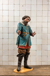 A large polychrome wooden figure of a nobleman, 18/19th C.