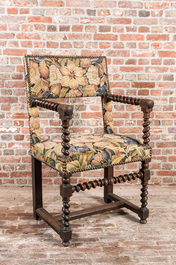 A walnut armchair with floral upholstery, 17th C.
