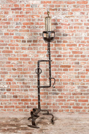 A large wrought iron candlestick transformed into a lamp, 19th C.