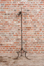 A large wrought iron candlestick, 19th C.