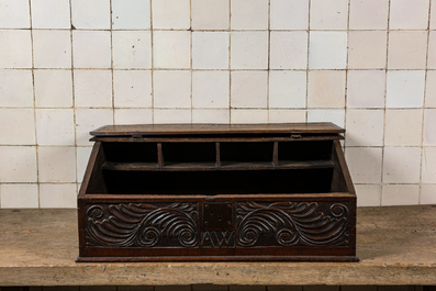 An English carved oak writing box monogrammed AW, 18th C.